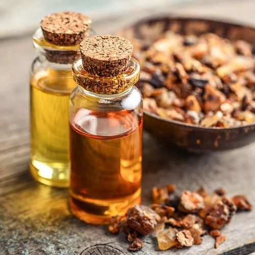 A bottle of myrrh essential oil with resin Stock Photo - Alamy
