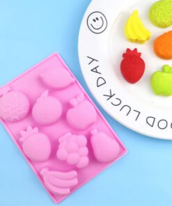 Angled view of pink 8-cavity fruit world silicone chocolate and soap mold