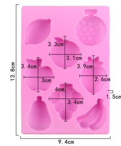 Angled view of pink 8-cavity fruit world silicone chocolate and soap mold