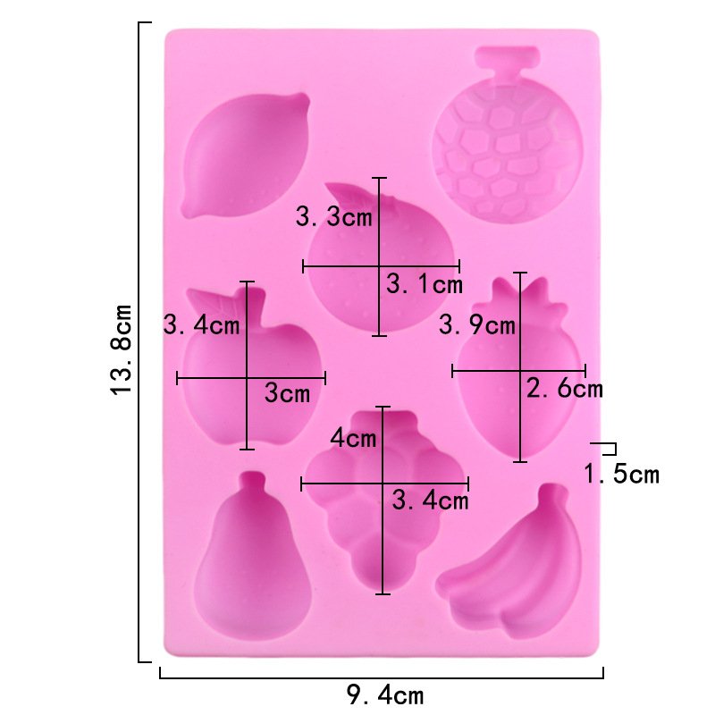 Angled view of pink 8-cavity fruit world silicone chocolate and soap mold