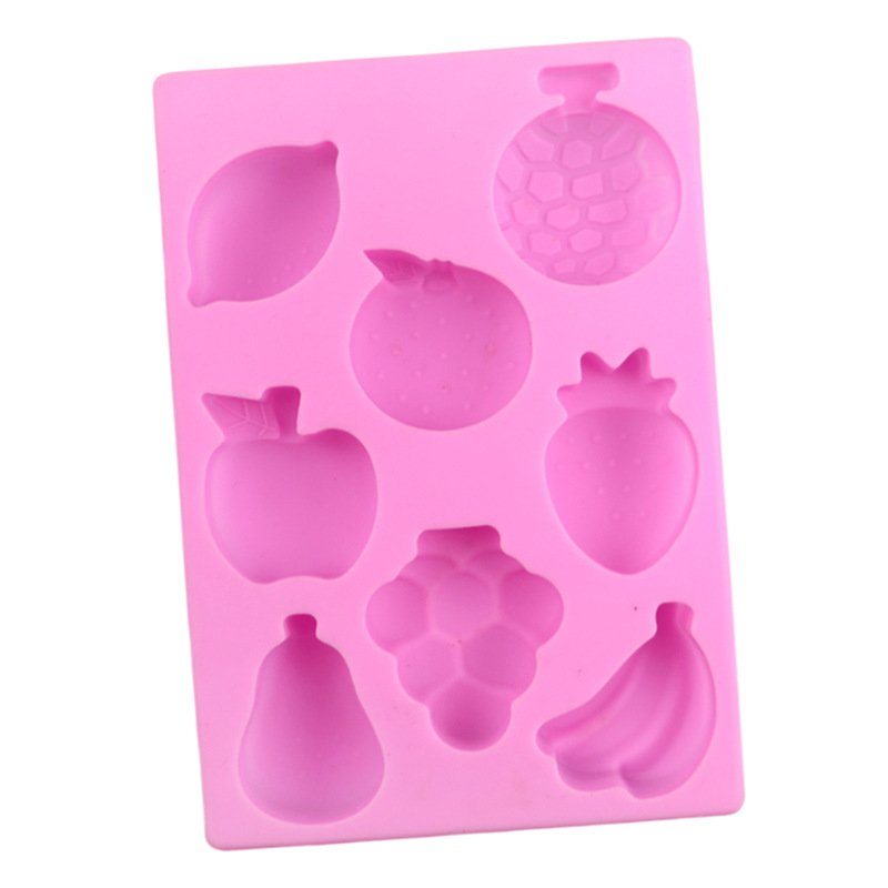 Angled view of pink 8-cavity fruit world silicone chocolate and soap mold