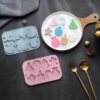 Vedini 8 Cavity Christmas Themed Snowman, Bell, Candle, Gingerbread Man, and Other Silicone Molds JKB-3560